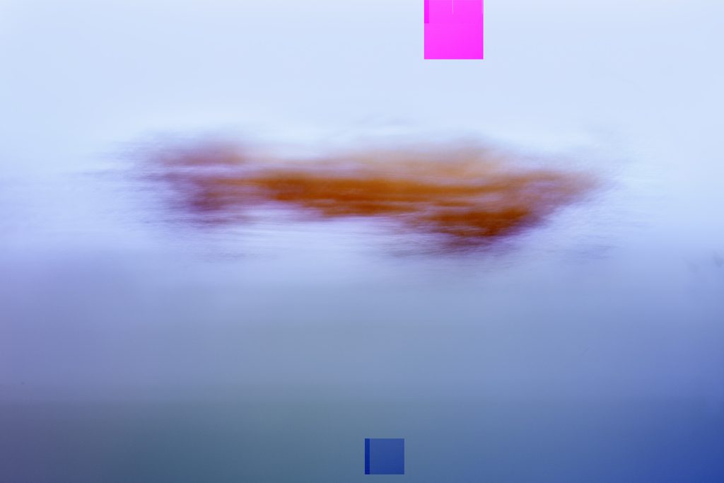 abstract image with colors of blue burnt organs and magenta. A swath of color floats i the middle of the image, a magenta square of color and a blue square of color are small in size and are at the top and bottom of the image.